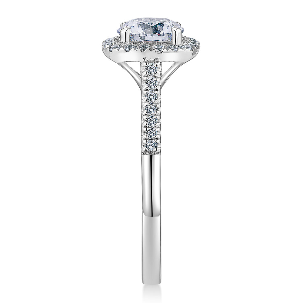 Round Brilliant halo engagement ring with 1.26 carats* of diamond simulants in 14 carat white gold