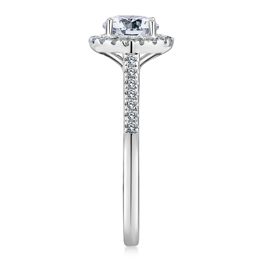 Round Brilliant halo engagement ring with 1.25 carats* of diamond simulants in 14 carat white gold