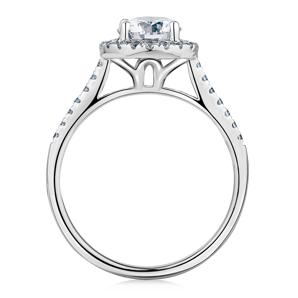 Round Brilliant halo engagement ring with 1.25 carats* of diamond simulants in 14 carat white gold
