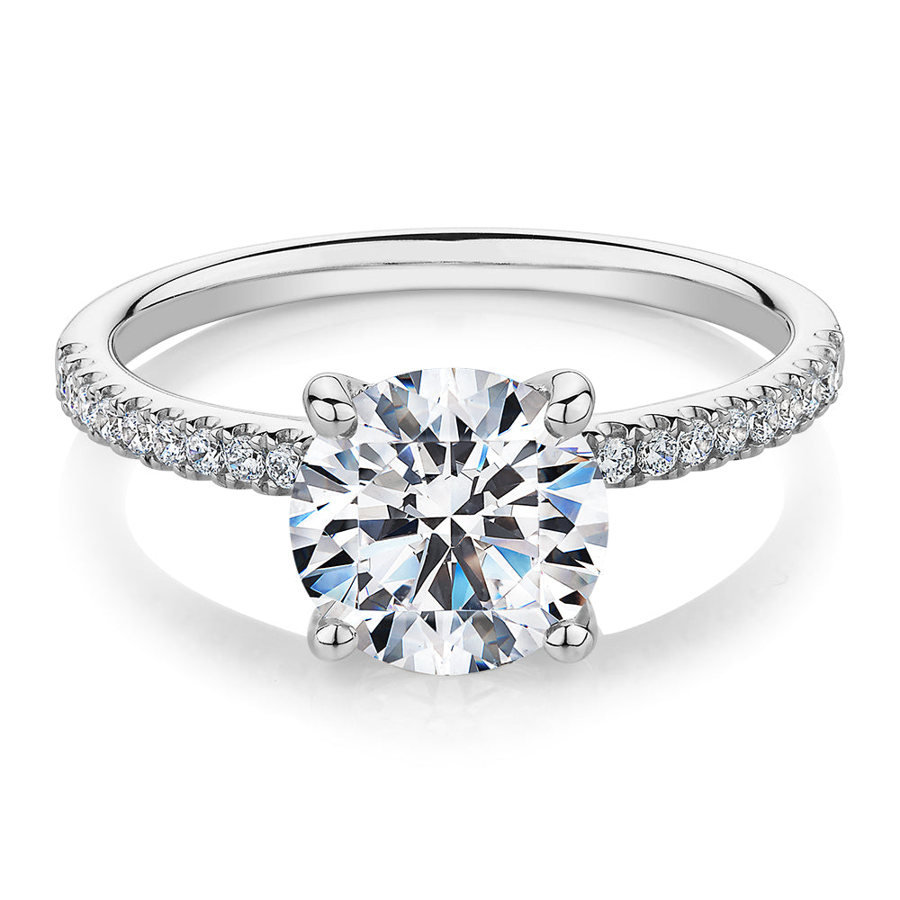 Round Brilliant shouldered engagement ring with 2.17 carats* of diamond simulants in 14 carat white gold