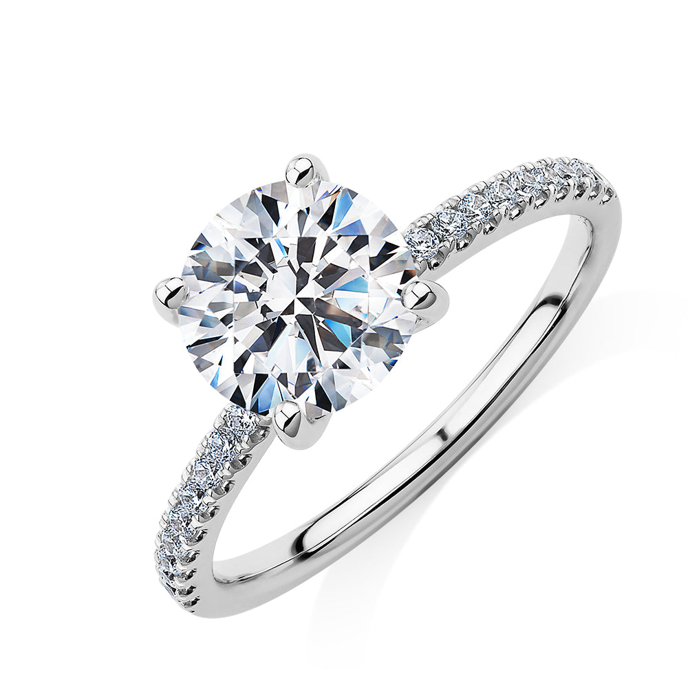 Round Brilliant shouldered engagement ring with 2.17 carats* of diamond simulants in 14 carat white gold