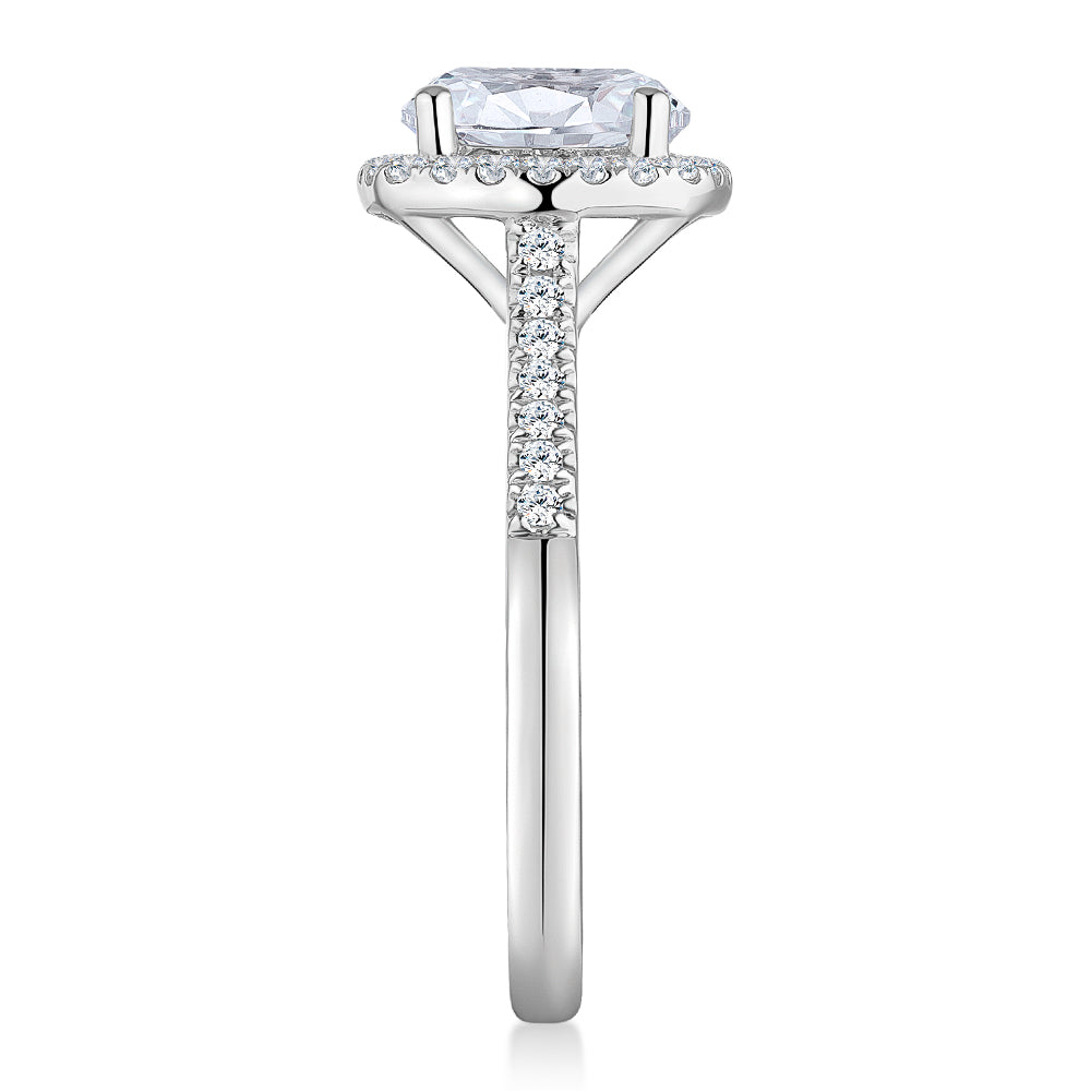 Round Brilliant halo engagement ring with 2.42 carats* of diamond simulants in 14 carat white gold