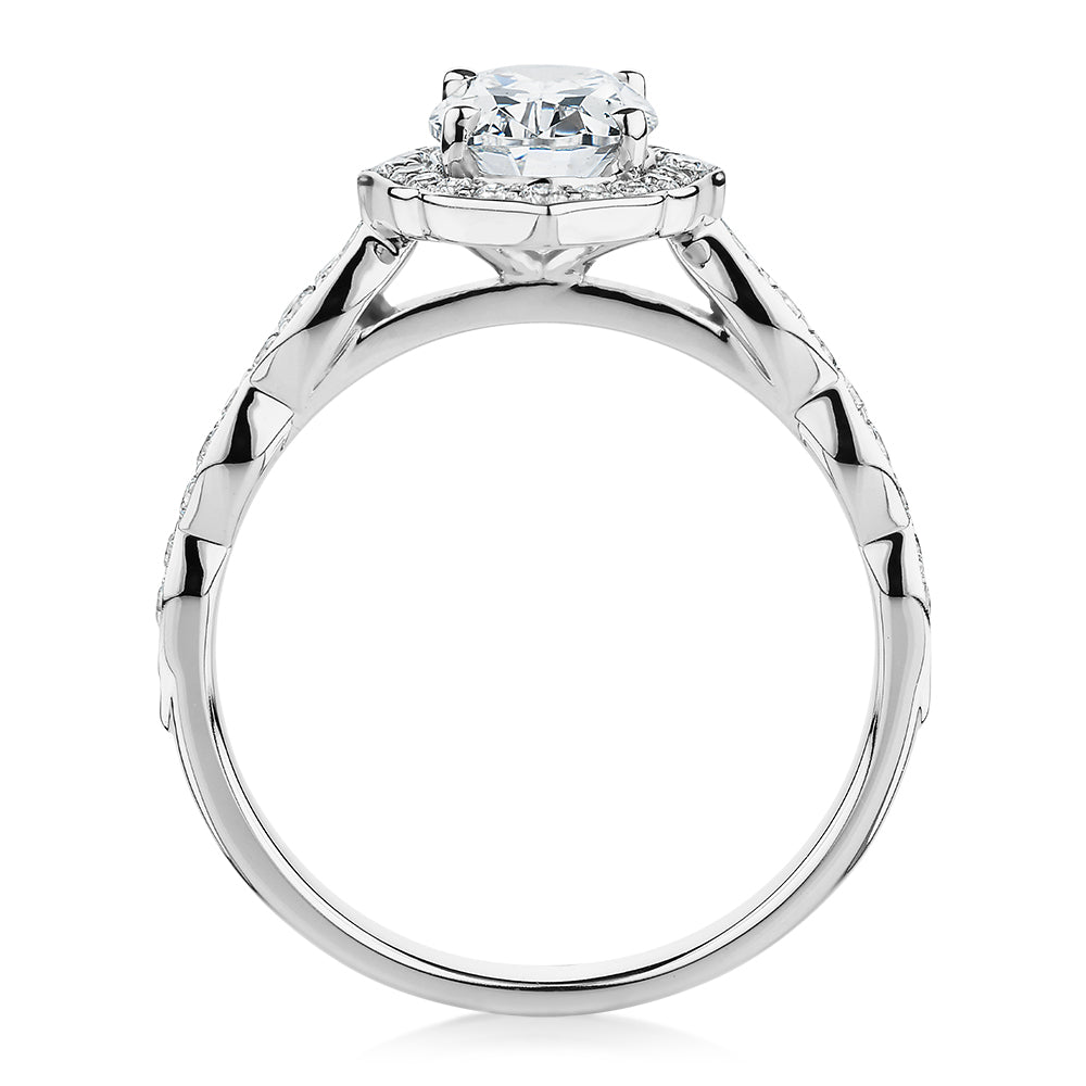 Oval halo engagement ring with 1.55 carats* of diamond simulants in 14 carat white gold