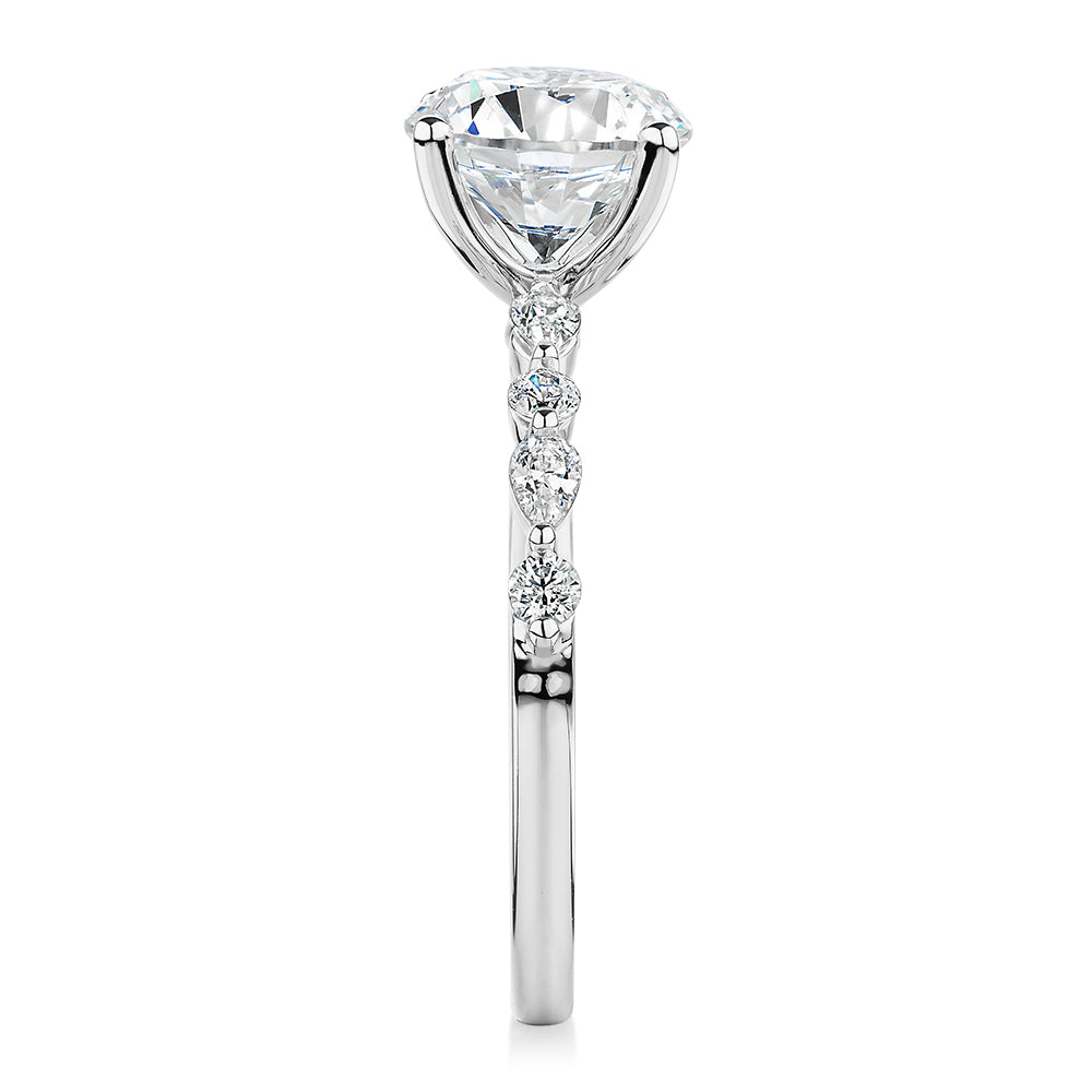 Round Brilliant and Pear shouldered engagement ring with 2.68 carats* of diamond simulants in 14 carat white gold