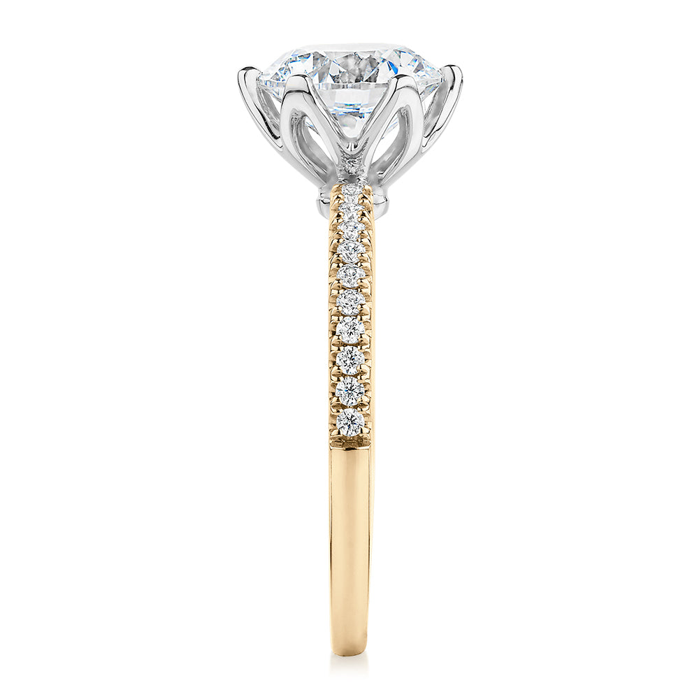 Round Brilliant shouldered engagement ring with 2.24 carats* of diamond simulants in 14 carat yellow and white gold
