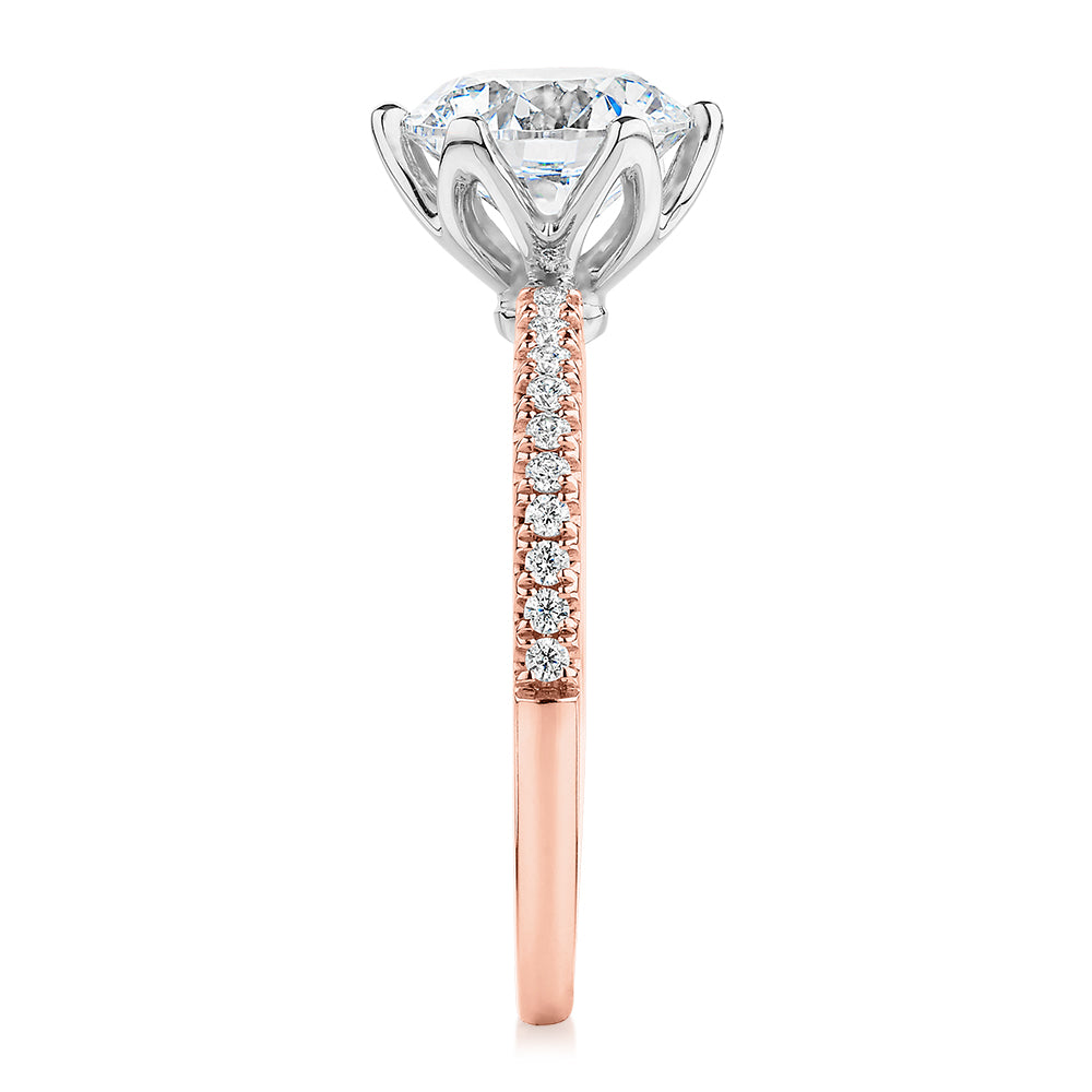 Round Brilliant shouldered engagement ring with 2.24 carats* of diamond simulants in 14 carat rose and white gold