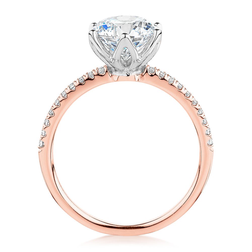 Round Brilliant shouldered engagement ring with 2.24 carats* of diamond simulants in 14 carat rose and white gold