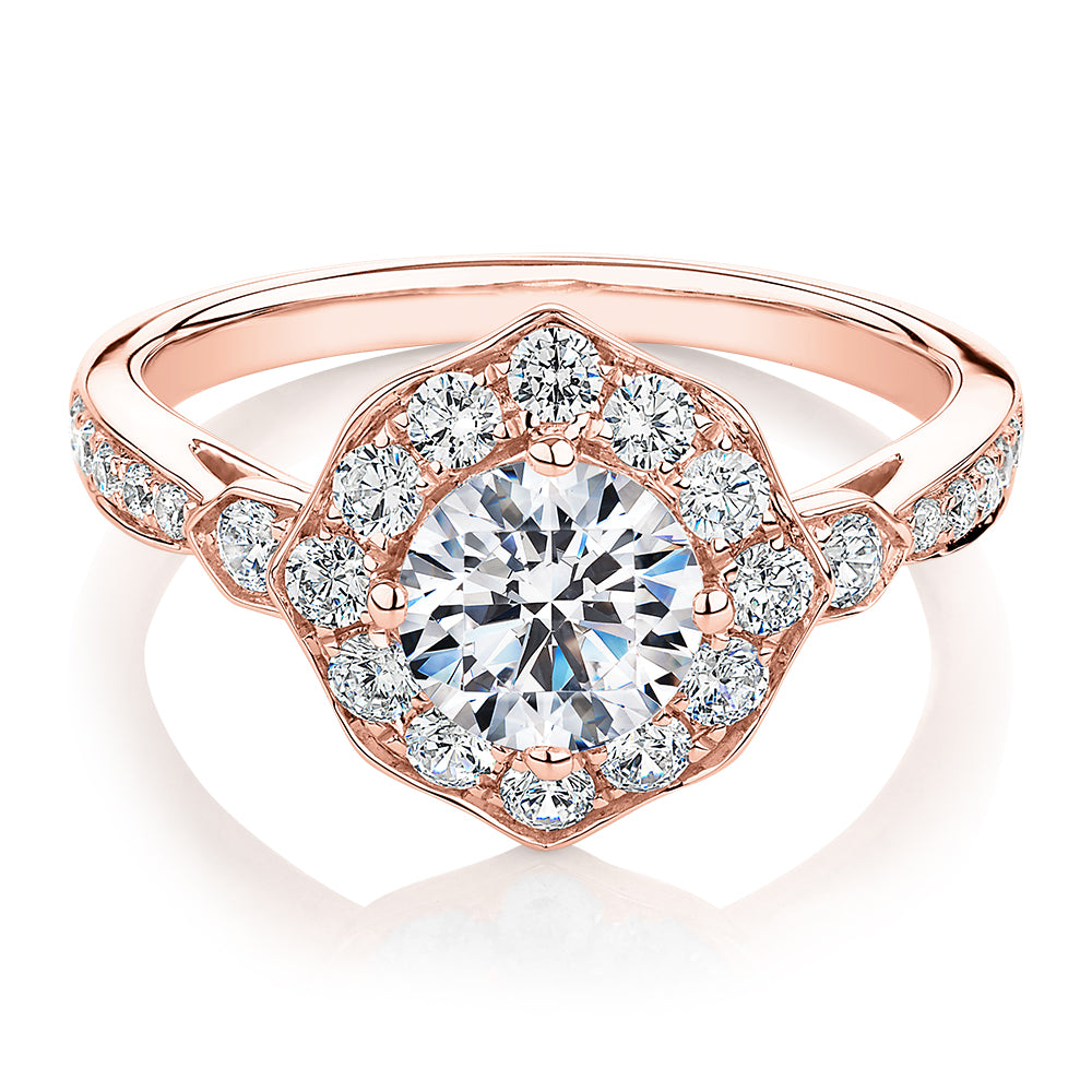 Round Brilliant halo engagement ring with 1.54 carats* of diamond simulants in 10 carat rose gold