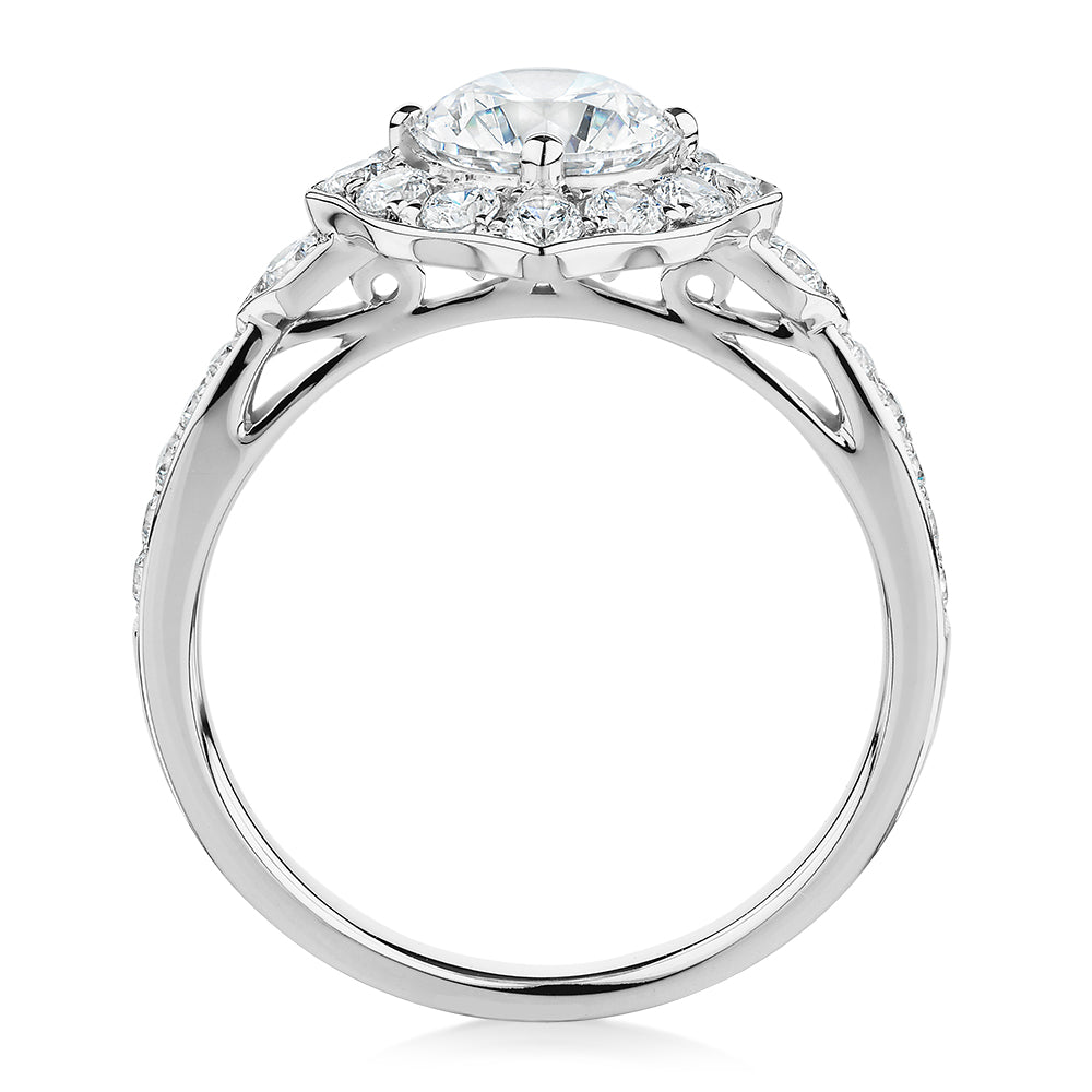 Round Brilliant halo engagement ring with 1.54 carats* of diamond simulants in 10 carat white gold