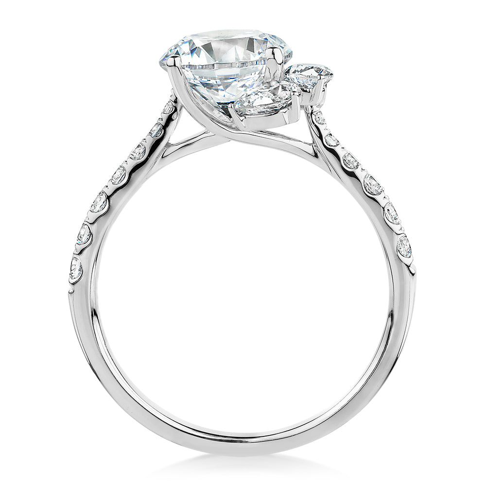 Round Brilliant and Marquise shouldered engagement ring with 2.78 carats* of diamond simulants in 14 carat white gold