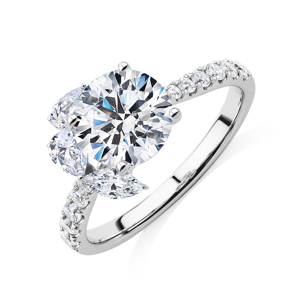 Round Brilliant and Marquise shouldered engagement ring with 2.78 carats* of diamond simulants in 14 carat white gold