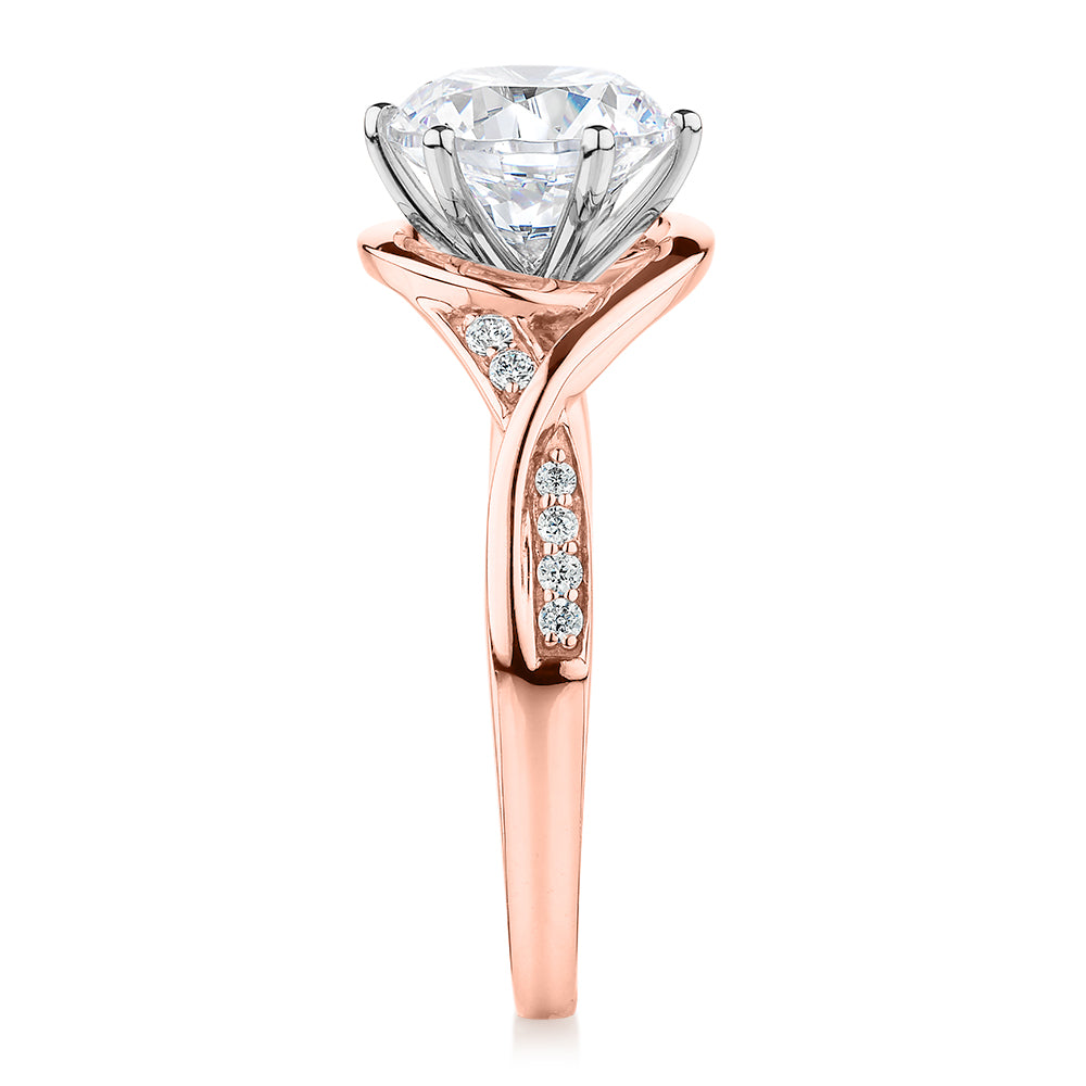 Round Brilliant shouldered engagement ring with 2.13 carats* of diamond simulants in 14 carat rose and white gold
