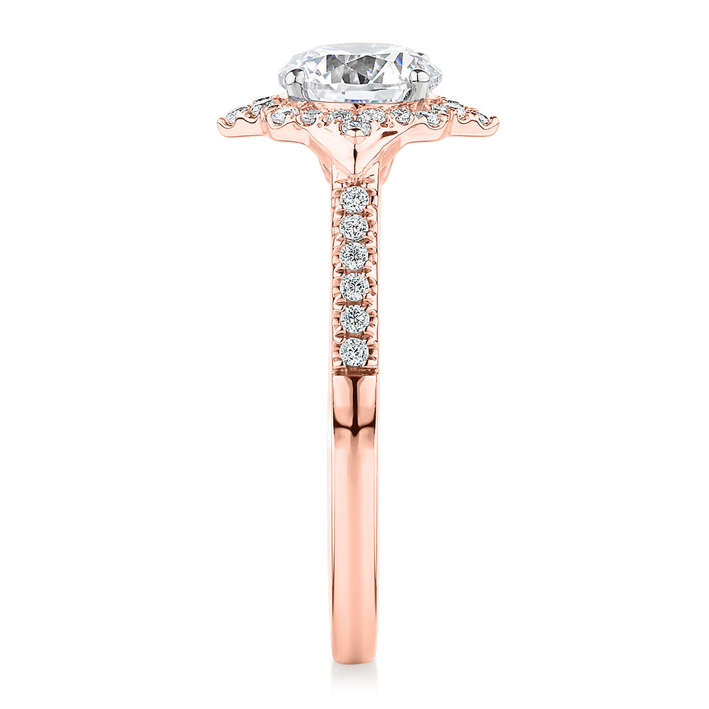 Round Brilliant halo engagement ring with 1.19 carats* of diamond simulants in 14 carat rose and white gold