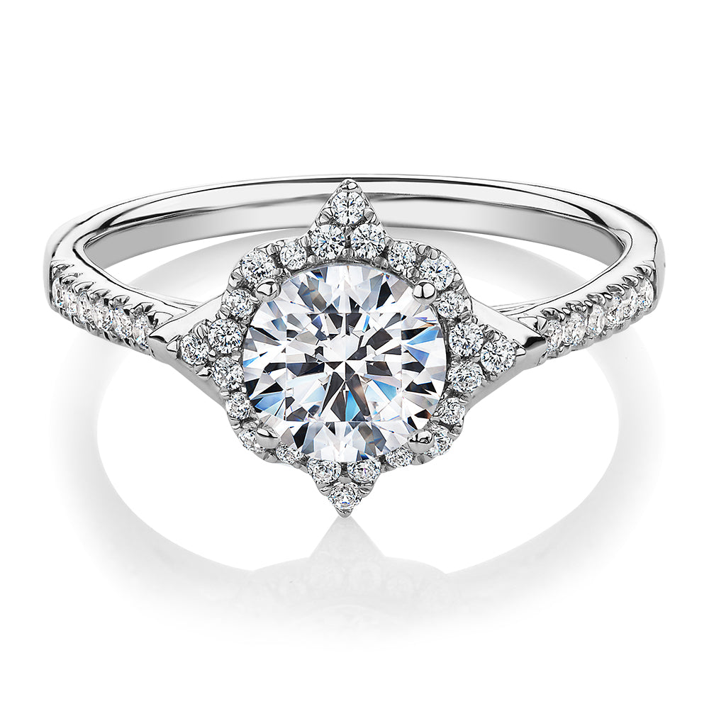 Round Brilliant halo engagement ring with 1.19 carats* of diamond simulants in 14 carat white gold