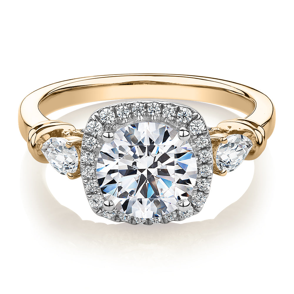 Round Brilliant halo engagement ring with 2.78 carats* of diamond simulants in 14 carat yellow and white gold