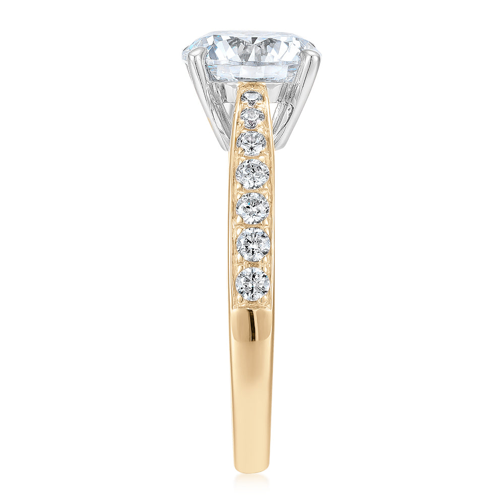Round Brilliant shouldered engagement ring with 2.32 carats* of diamond simulants in 14 carat yellow and white gold