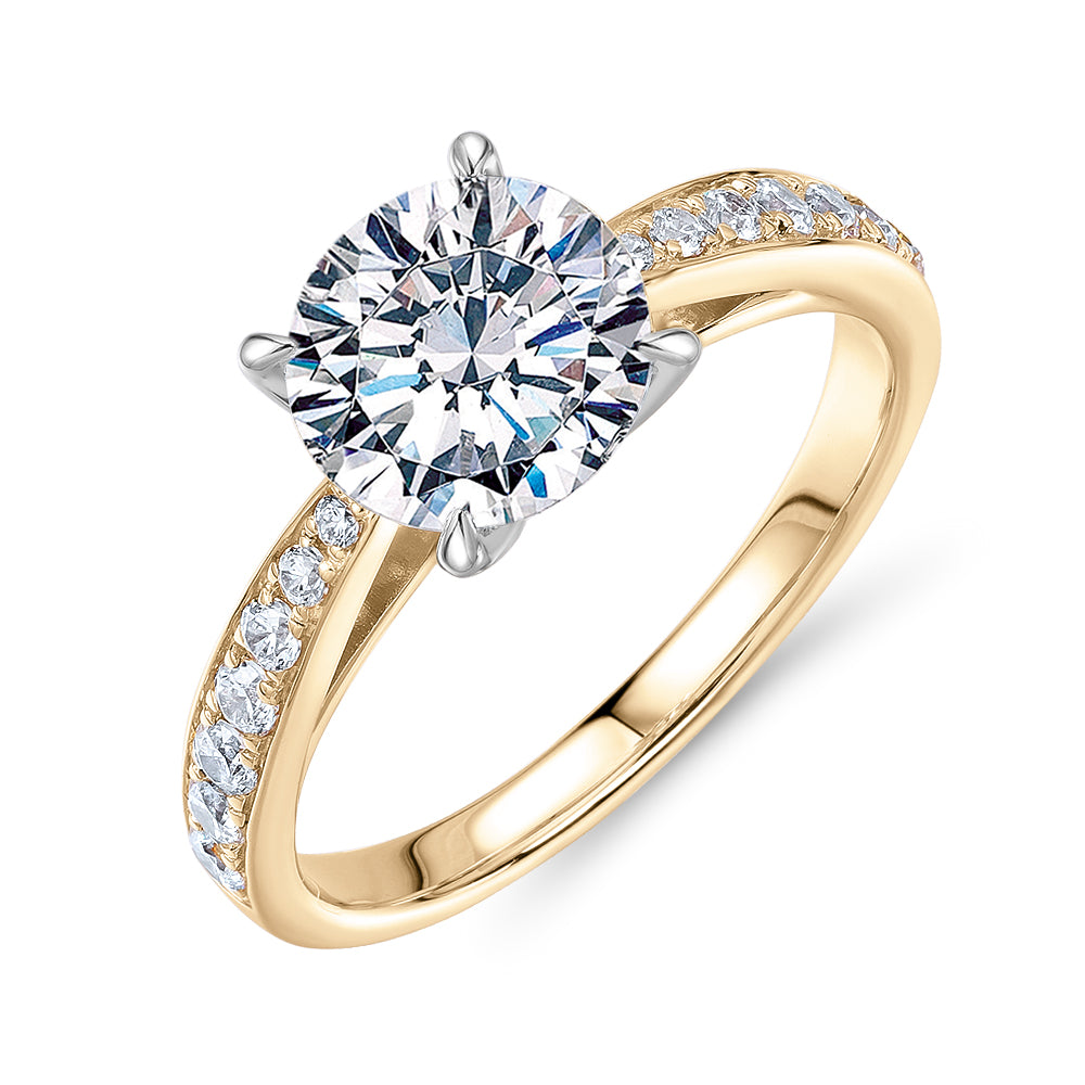 Round Brilliant shouldered engagement ring with 2.32 carats* of diamond simulants in 14 carat yellow and white gold