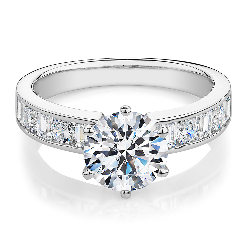 Round Brilliant and Baguette shouldered engagement ring with 2.72 carats* of diamond simulants in 14 carat white gold