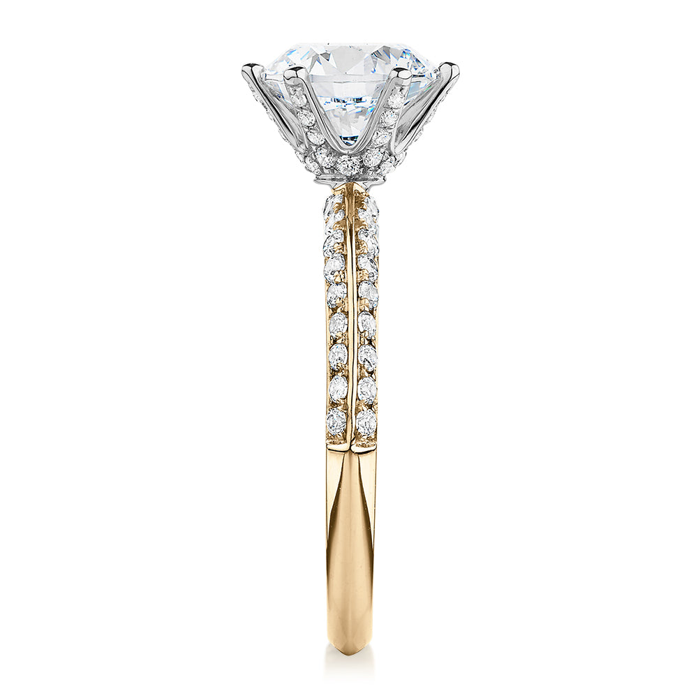 Round Brilliant shouldered engagement ring with 2.47 carats* of diamond simulants in 14 carat yellow and white gold