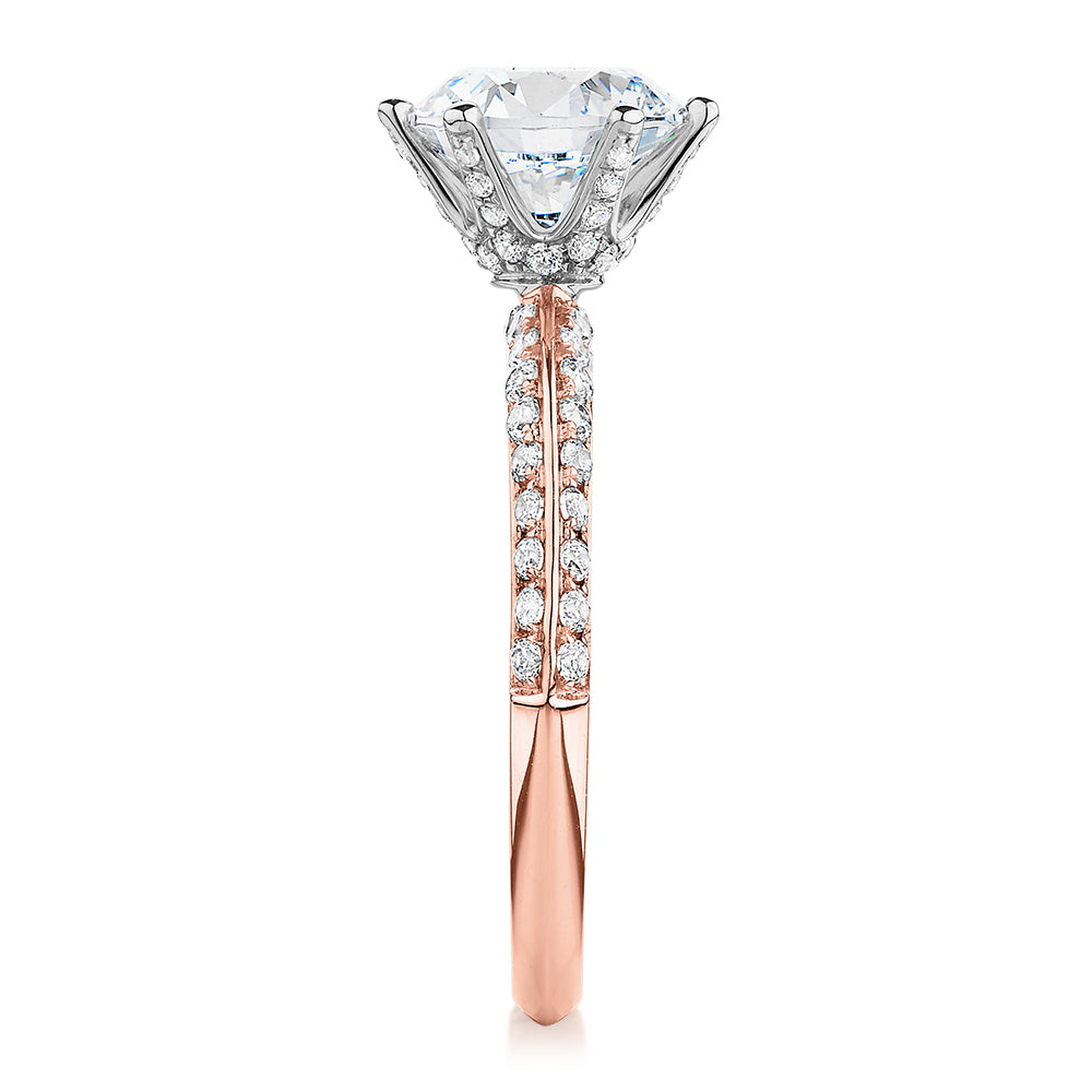 Round Brilliant shouldered engagement ring with 2.47 carats* of diamond simulants in 14 carat rose and white gold