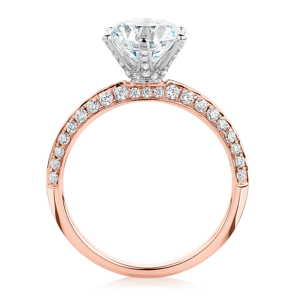 Round Brilliant shouldered engagement ring with 2.47 carats* of diamond simulants in 14 carat rose and white gold