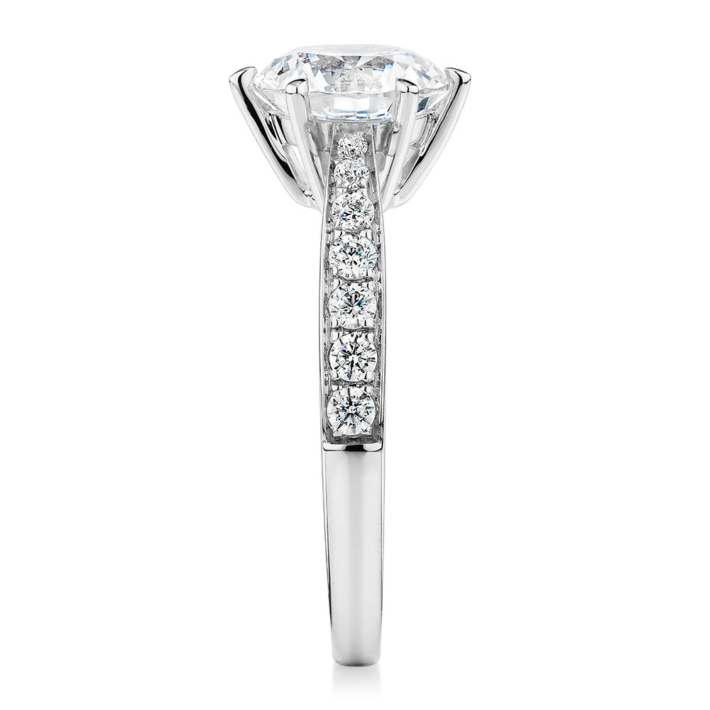 Round Brilliant shouldered engagement ring with 2.3 carats* of diamond simulants in 14 carat white gold