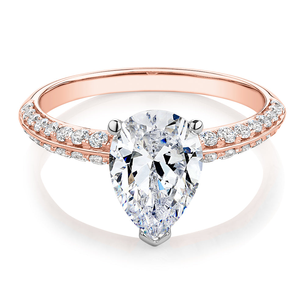 Pear shouldered engagement ring with 2.22 carats* of diamond simulants in 14 carat rose and white gold