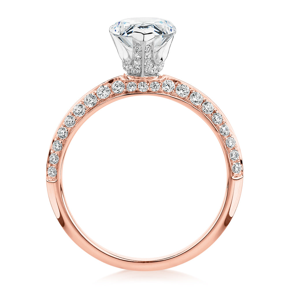 Pear shouldered engagement ring with 2.22 carats* of diamond simulants in 14 carat rose and white gold
