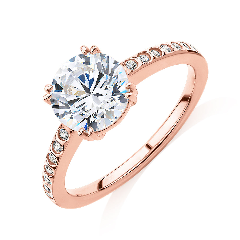 Round Brilliant shouldered engagement ring with 2.17 carats* of diamond simulants in 14 carat rose gold