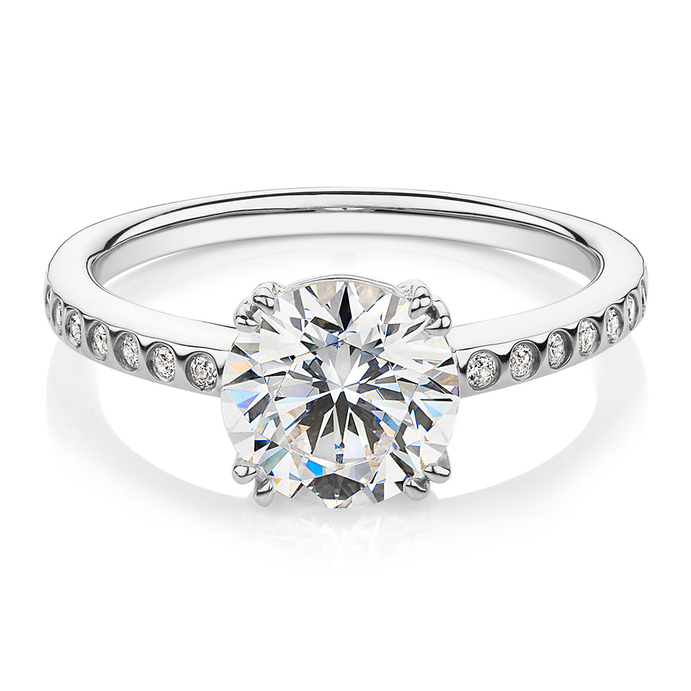 Round Brilliant shouldered engagement ring with 2.17 carats* of diamond simulants in 14 carat white gold
