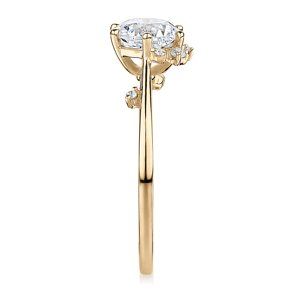 Round Brilliant shouldered engagement ring with 1.07 carats* of diamond simulants in 14 carat yellow gold