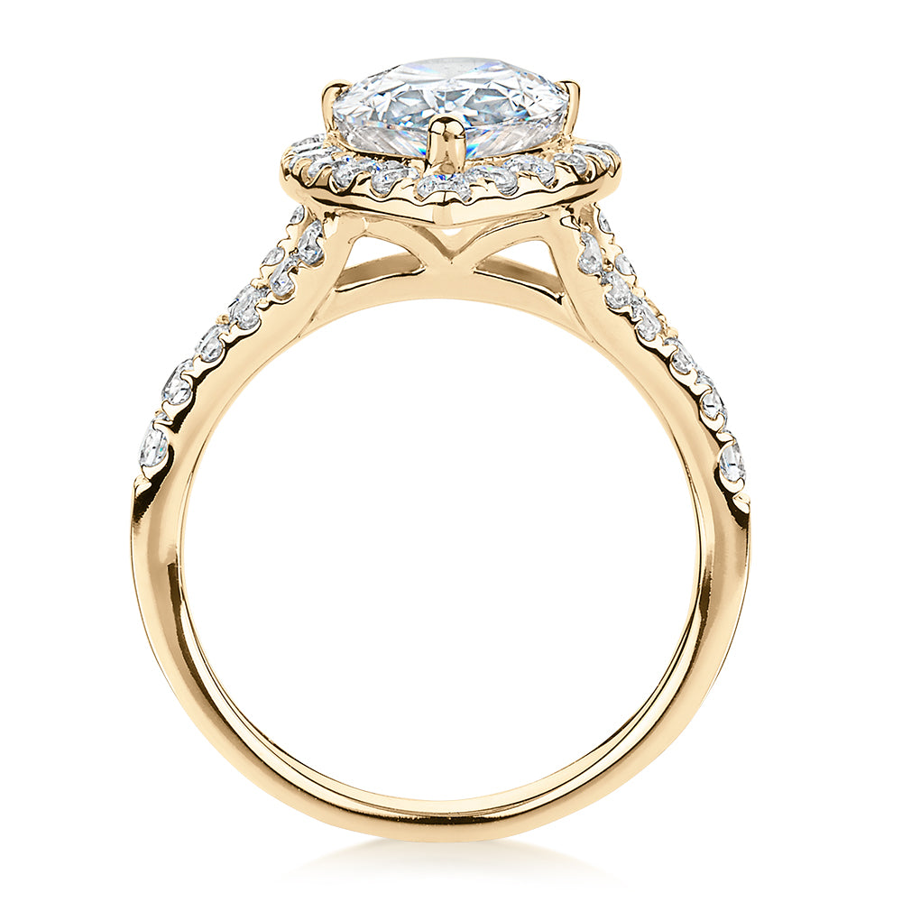Pear and Round Brilliant halo engagement ring with 3.81 carats* of diamond simulants in 10 carat yellow gold