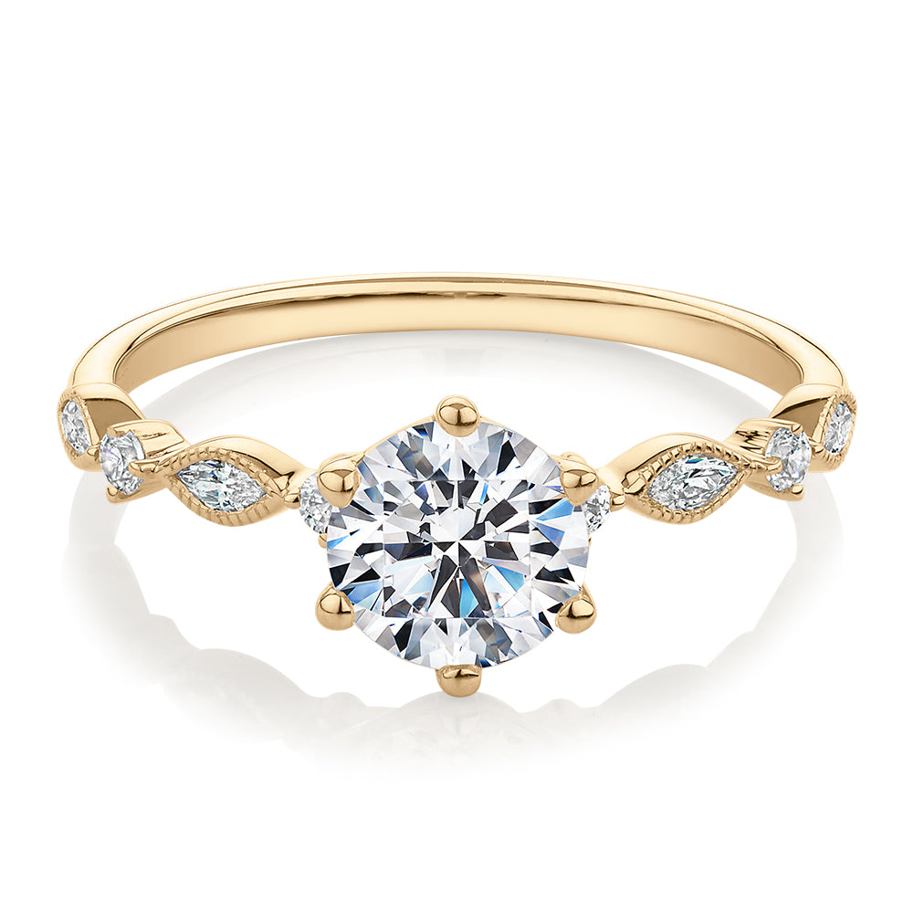 Round Brilliant shouldered engagement ring with 1.19 carats* of diamond simulants in 14 carat yellow gold