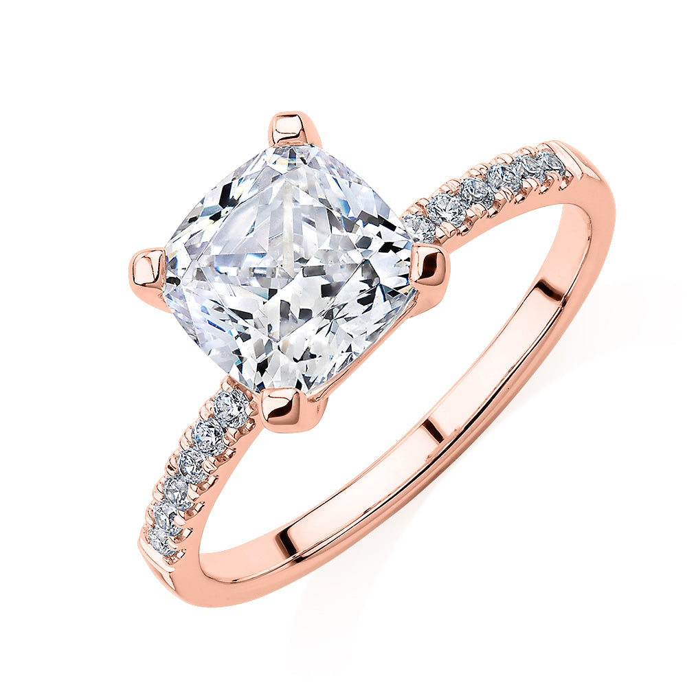 Cushion and Round Brilliant shouldered engagement ring with 1.79 carats* of diamond simulants in 14 carat rose gold