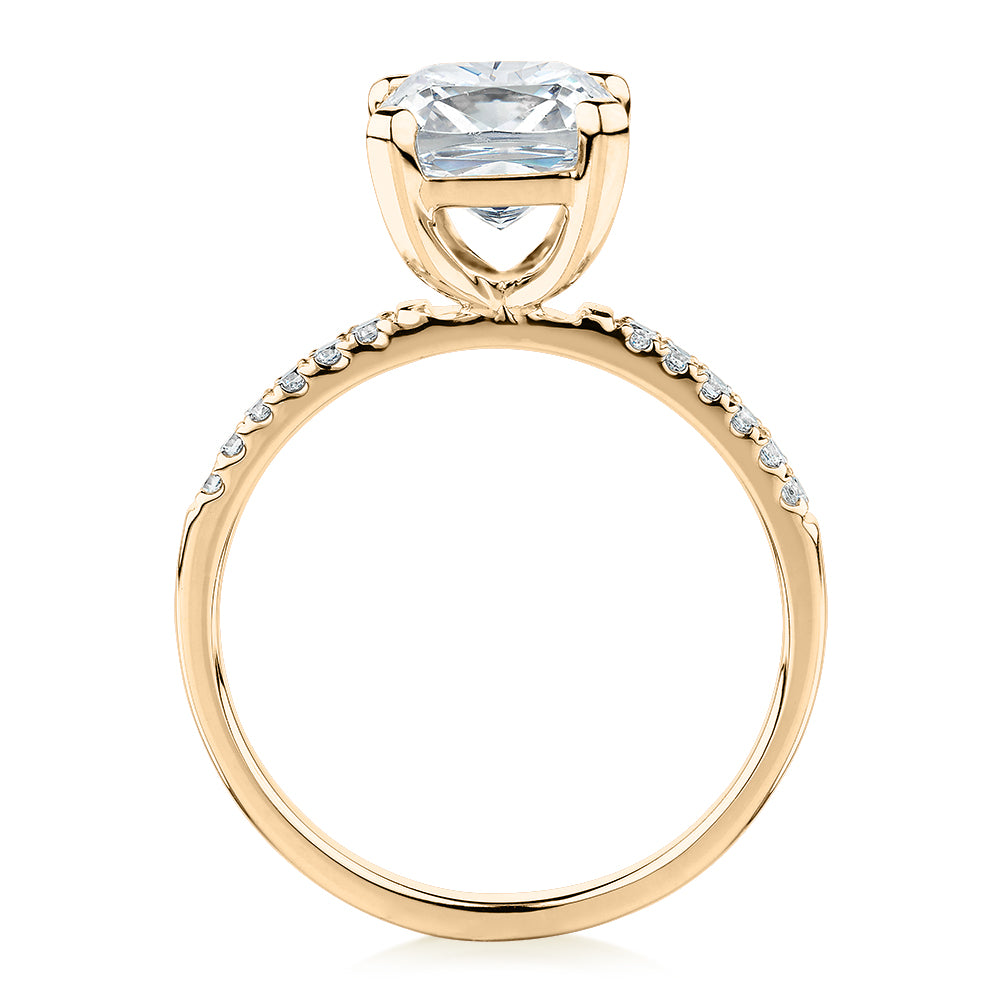 Cushion and Round Brilliant shouldered engagement ring with 1.79 carats* of diamond simulants in 14 carat yellow gold