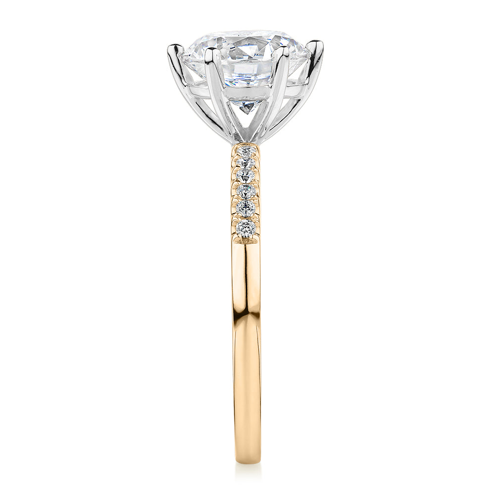 Round Brilliant shouldered engagement ring with 2.12 carats* of diamond simulants in 14 carat yellow and white gold