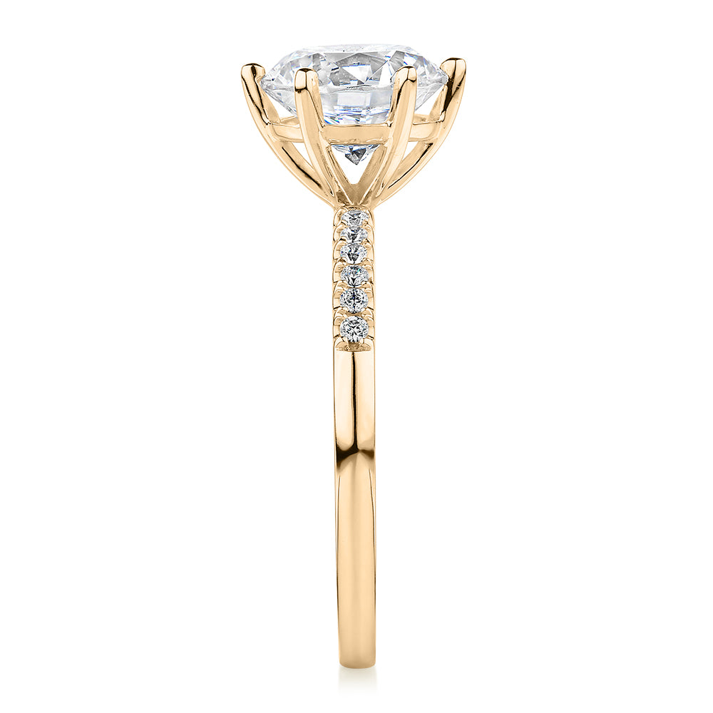Round Brilliant shouldered engagement ring with 2.12 carats* of diamond simulants in 14 carat yellow gold