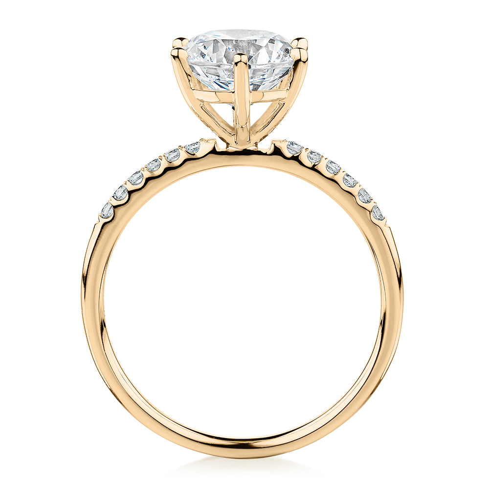 Round Brilliant shouldered engagement ring with 2.12 carats* of diamond simulants in 14 carat yellow gold