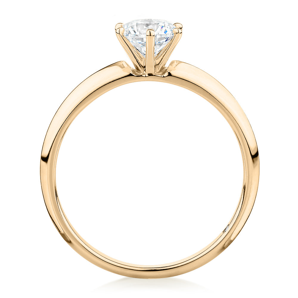 Round Brilliant solitaire engagement ring with 0.70 carat* diamond simulant in 14 carat yellow gold