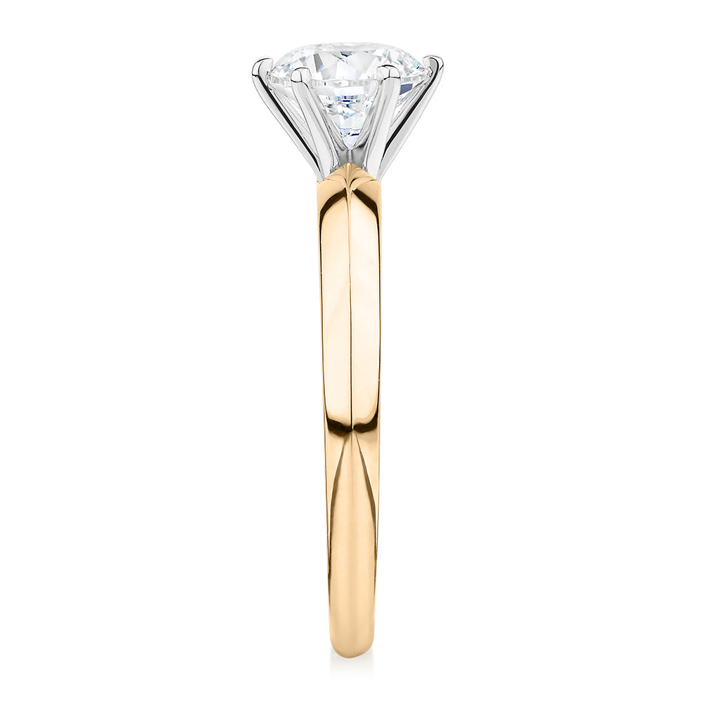 Round Brilliant solitaire engagement ring with 1 carat* diamond simulant in 14 carat yellow and white gold