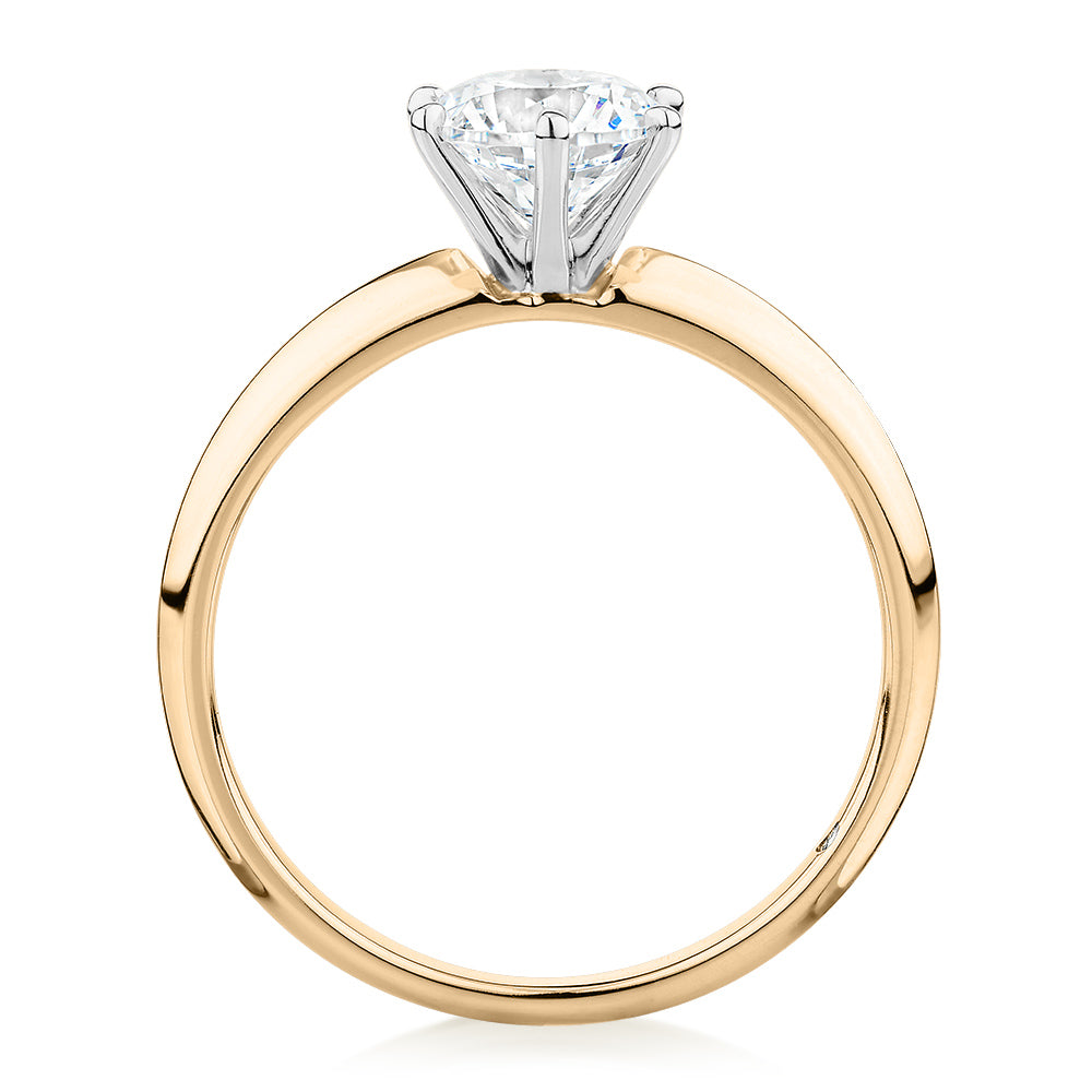 Round Brilliant solitaire engagement ring with 1 carat* diamond simulant in 14 carat yellow and white gold