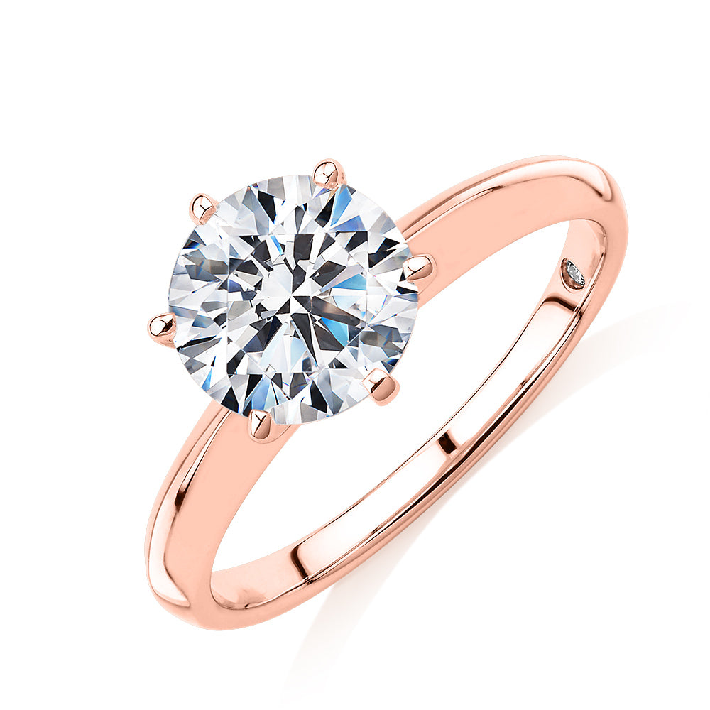 Round Brilliant solitaire engagement ring with 2 carat* diamond simulant in 14 carat rose gold