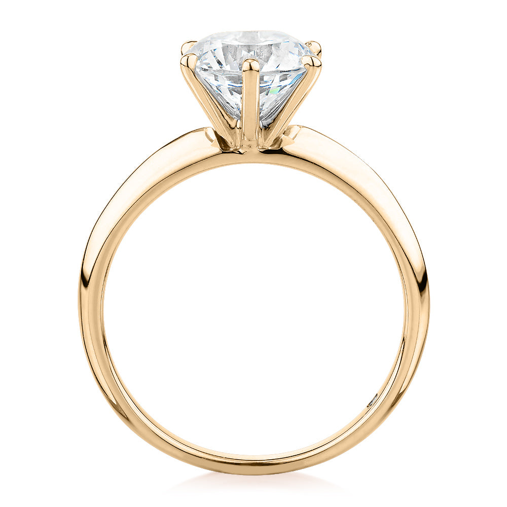 Round Brilliant solitaire engagement ring with 2 carat* diamond simulant in 14 carat yellow gold