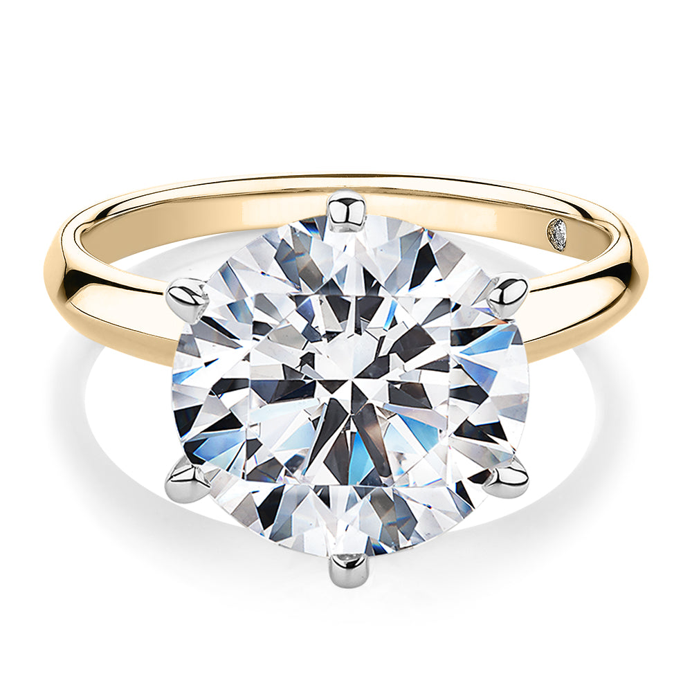 Round Brilliant solitaire engagement ring with 7 carat* diamond simulant in 14 carat yellow and white gold