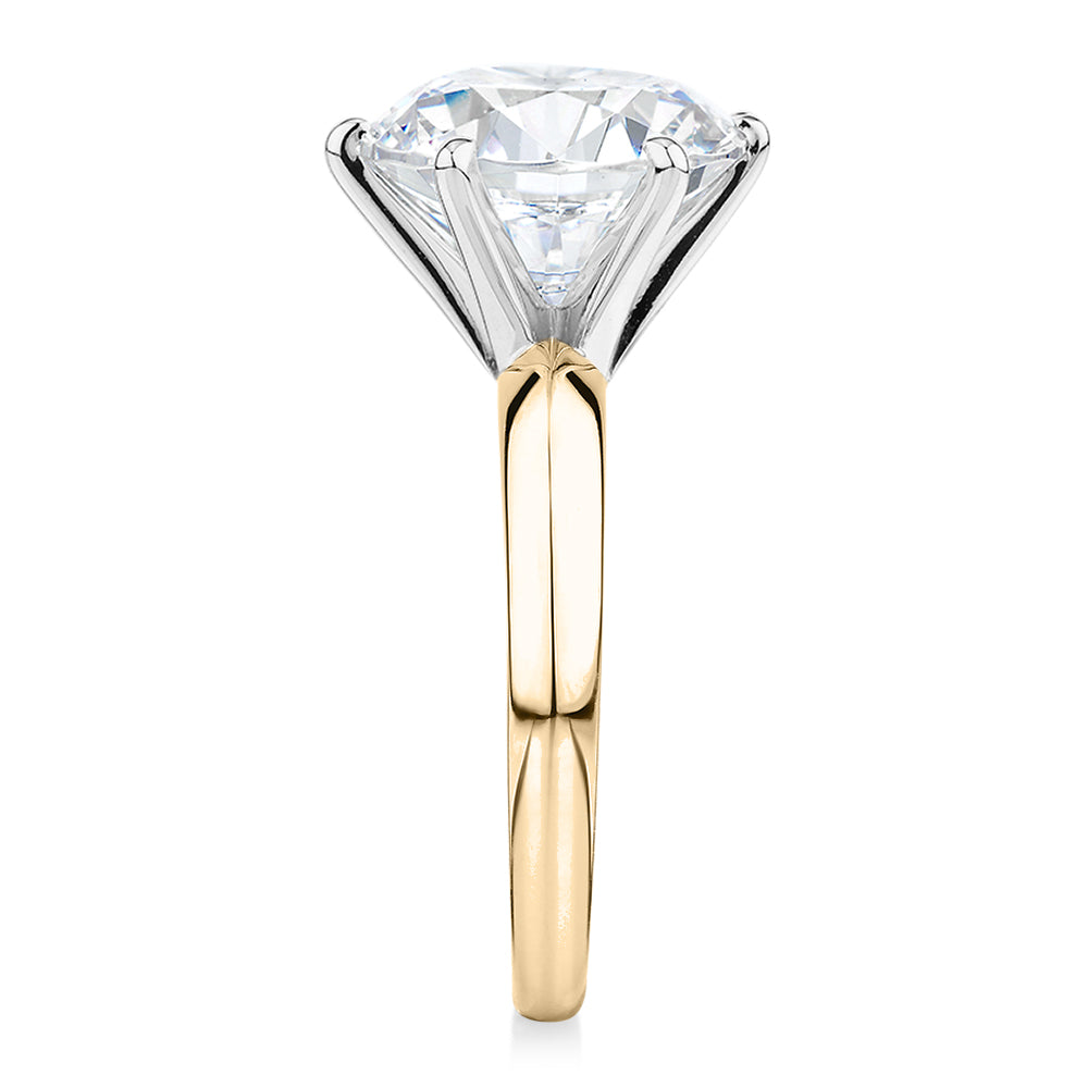 Round Brilliant solitaire engagement ring with 7 carat* diamond simulant in 14 carat yellow and white gold