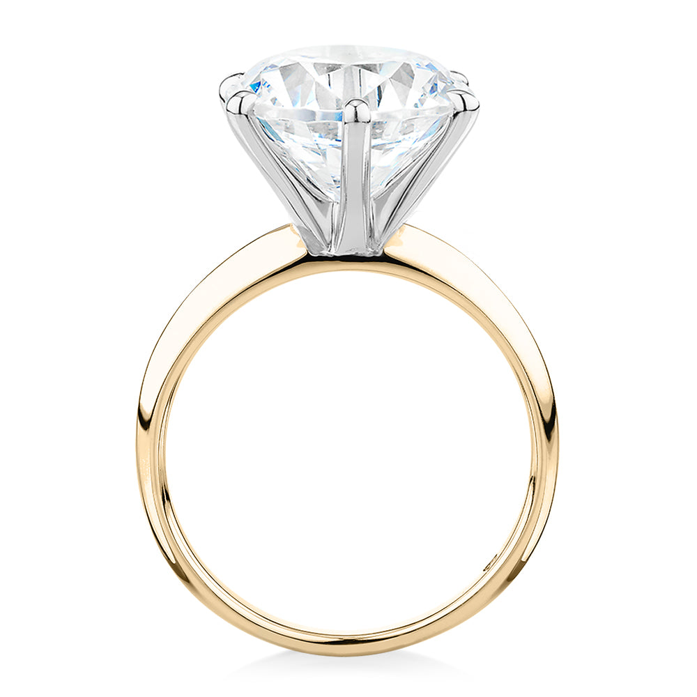 Round Brilliant solitaire engagement ring with 7 carat* diamond simulant in 14 carat yellow and white gold