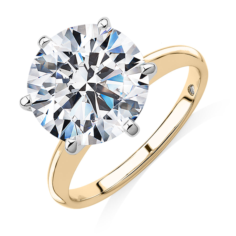 Round Brilliant solitaire engagement ring with 7 carat* diamond simulant in 14 carat yellow and white gold