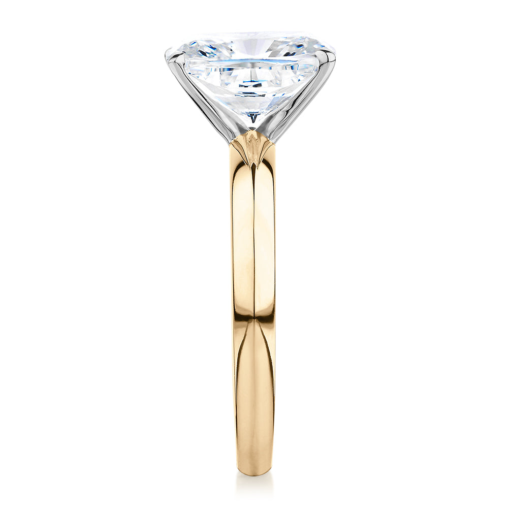 Cushion Radiant solitaire engagement ring with 3.49 carat* diamond simulant in 14 carat yellow and white gold