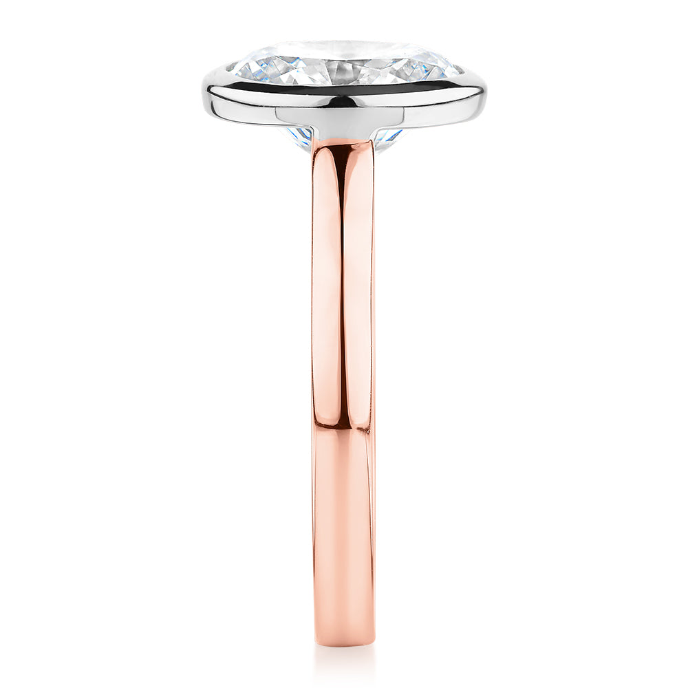 Oval solitaire engagement ring with 2.54 carat* diamond simulant in 14 carat rose and white gold