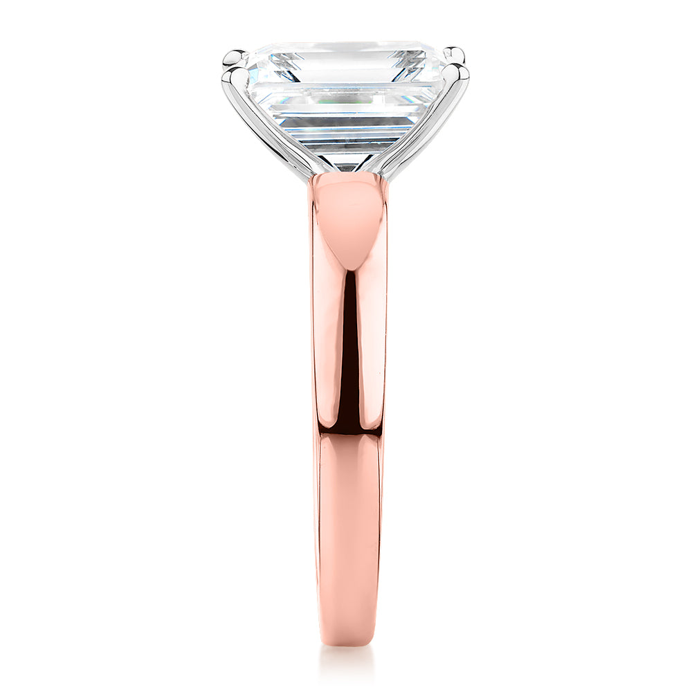 Emerald Cut solitaire engagement ring with 3.01 carat* diamond simulant in 14 carat rose and white gold